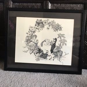 Hand-drawn bunny in a wreath of flowers framed